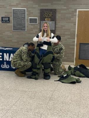 Navy representatives demonstrating a tatical procedure